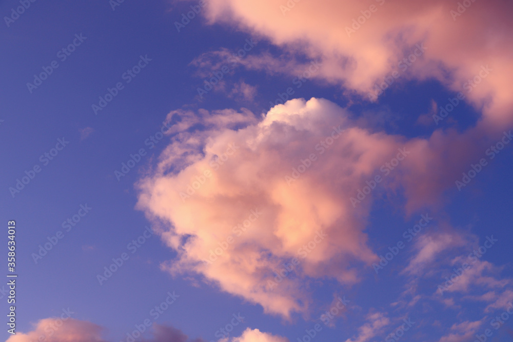 Blue sky with red clouds