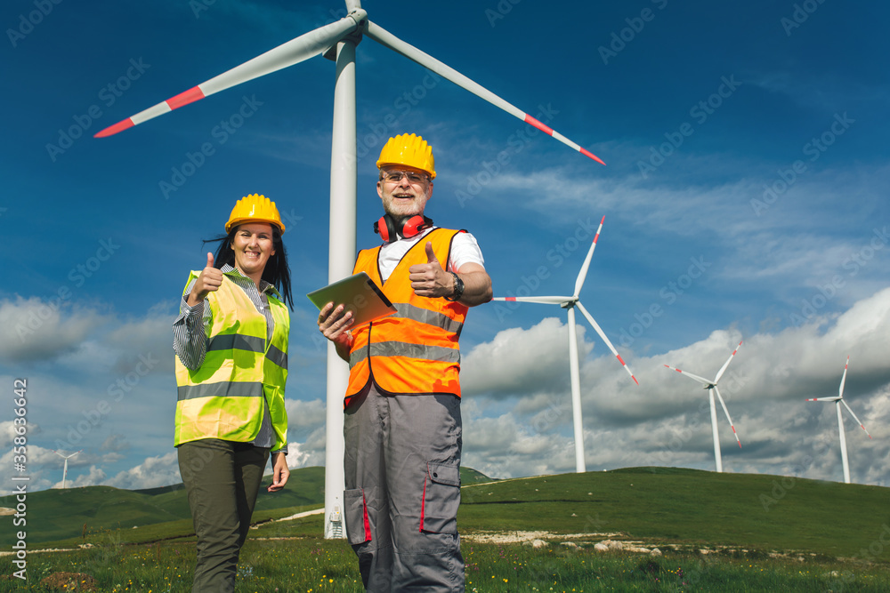 Windmill engineers inspection and progress check wind turbine Windmill engineers inspection and progress check wind turbine
