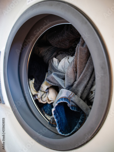 Dirty clothes in the washing machine ready to be washed