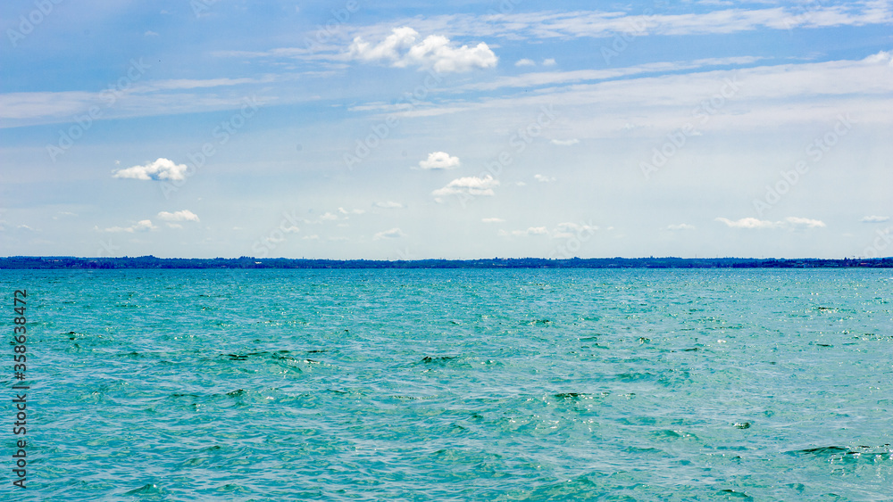 It's Lake Garda in Sirmione, Italy. Lake Garda is the largest lake in Italy (369, 98 km2) It's Lake Garda in Sirmione, Italy. Lake Garda is the largest lake in Italy (369, 98 km2)
