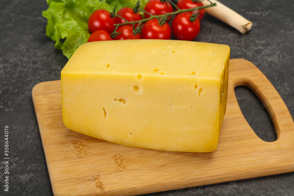 Hard yellow tasty cheese brick Hard yellow tasty cheese brick