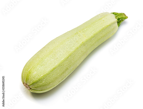 Fresh green zucchini isolated on a white background