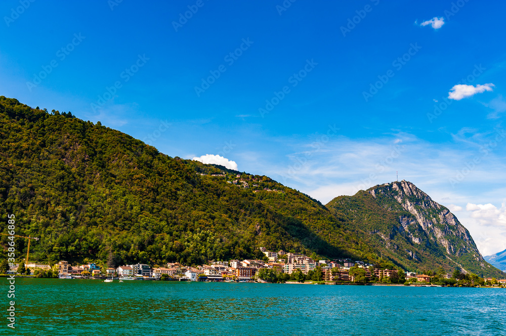 Lake Lugano, a glacial lake situated on the border between south-east Switzerland and Italy.