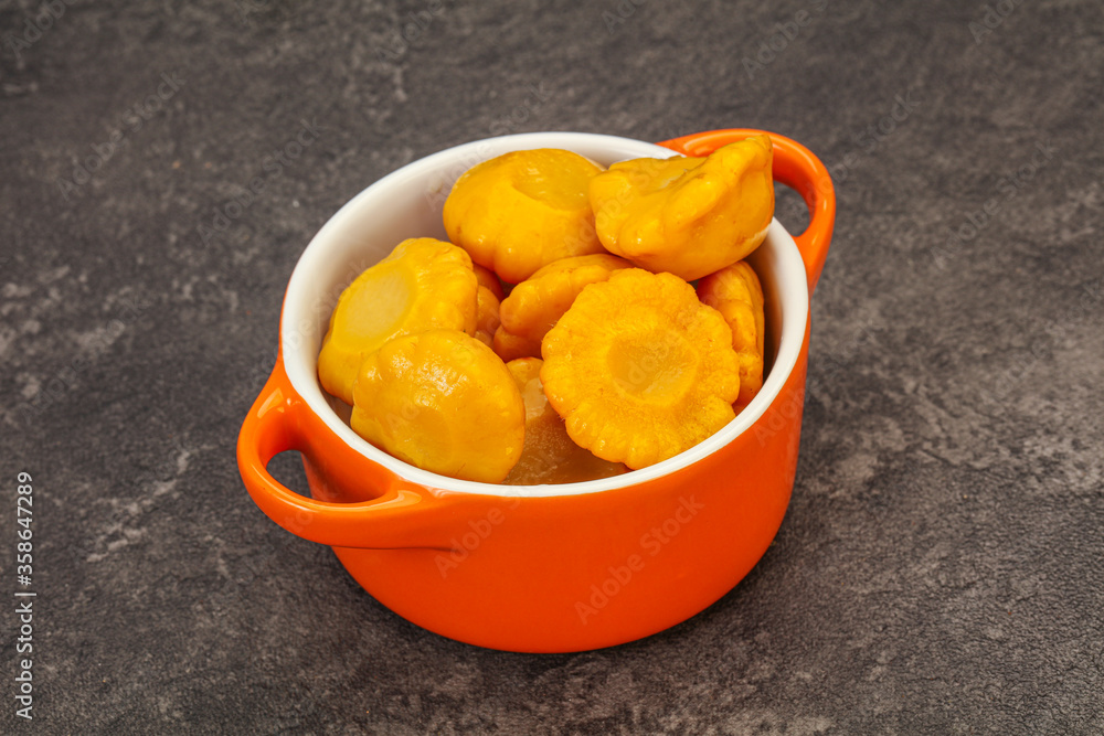 Marinated yellow patisson in the bowl Marinated yellow patisson in the bowl