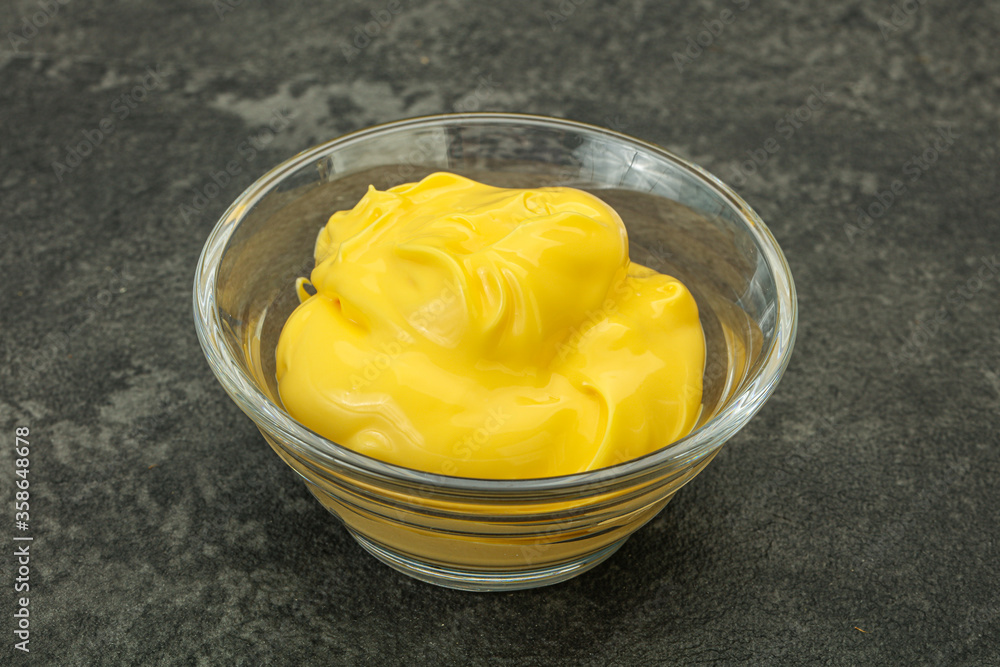 Natural cheese sauce in the bowl Natural cheese sauce in the bowl