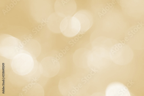 Beautiful autumn and holiday background. Sunlight bokeh close-up. Yellow texture. A subject for holidays, a birthday, a congratulation. A banner for advertizing, christmans, xmas.
