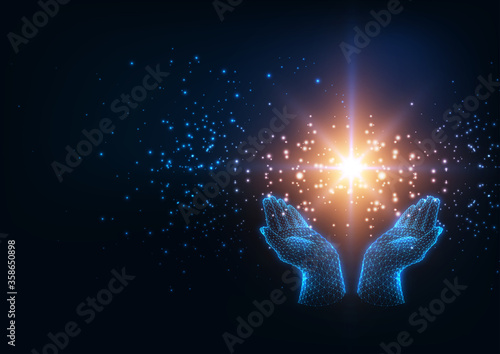 Futuristic healing energy concept with glowing low poly human hands holding magic sparkling star