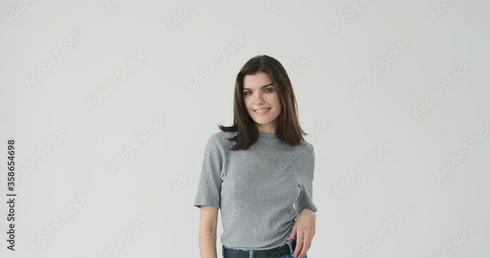 Portrait of beautiful woman posing over white background Portrait of beautiful woman posing over white background