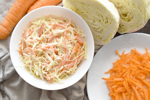 Coleslaw salad with cabbage and carrot.  Healthy and dietary food concept. 