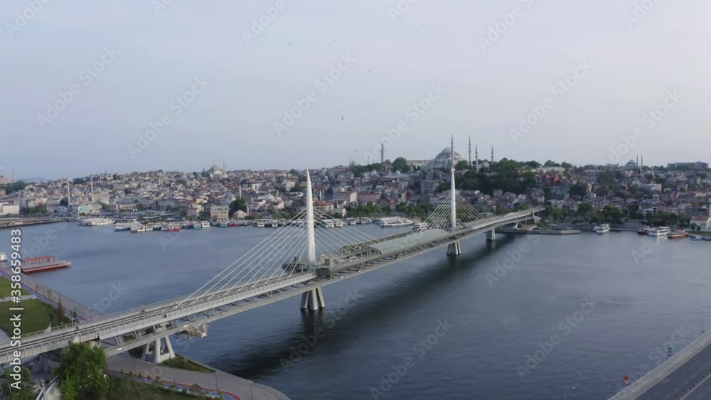 Aerial view of Golden Horn Metro Bridge and Mosque.4K Footage in Turkey Aerial view of Golden Horn Metro Bridge and Mosque.4K Footage in Turkey