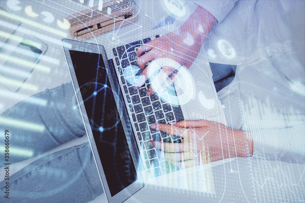 Double exposure of woman hands working on computer and data theme hologram drawing. Top View. Technology concept.