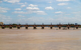 Panoramic view of the old stone bridge Pont de Pierre over the river Garonne in Bordeaux.