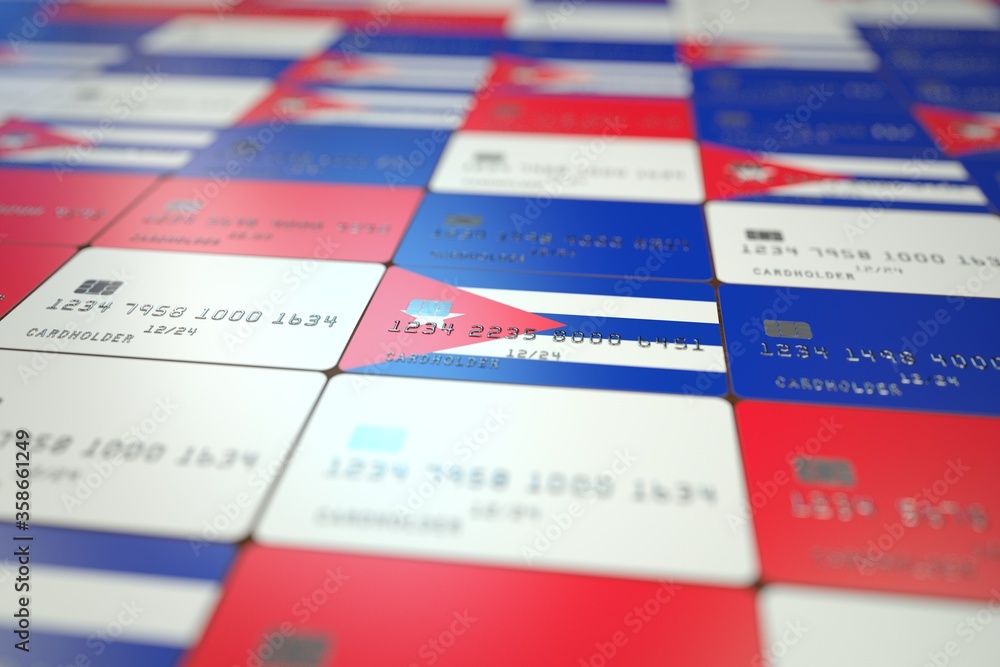 National flag of Cuba on credit cards. Banking related 3D rendering National flag of Cuba on credit cards. Banking related 3D rendering