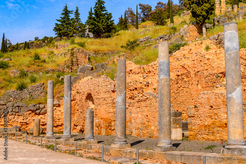 It's Columns in Delphi, an archaeological site in Greece, at the Mount Parnassus. Delphi is famous by the oracle at the sanctuary dedicated to Apollo. UNESCO World heritage photo