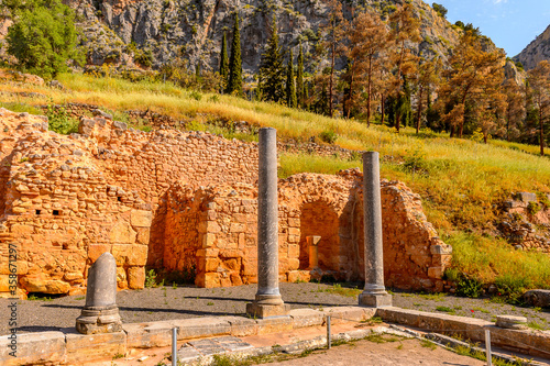 It's Columns in Delphi, an archaeological site in Greece, at the Mount Parnassus. Delphi is famous by the oracle at the sanctuary dedicated to Apollo. UNESCO World heritage photo