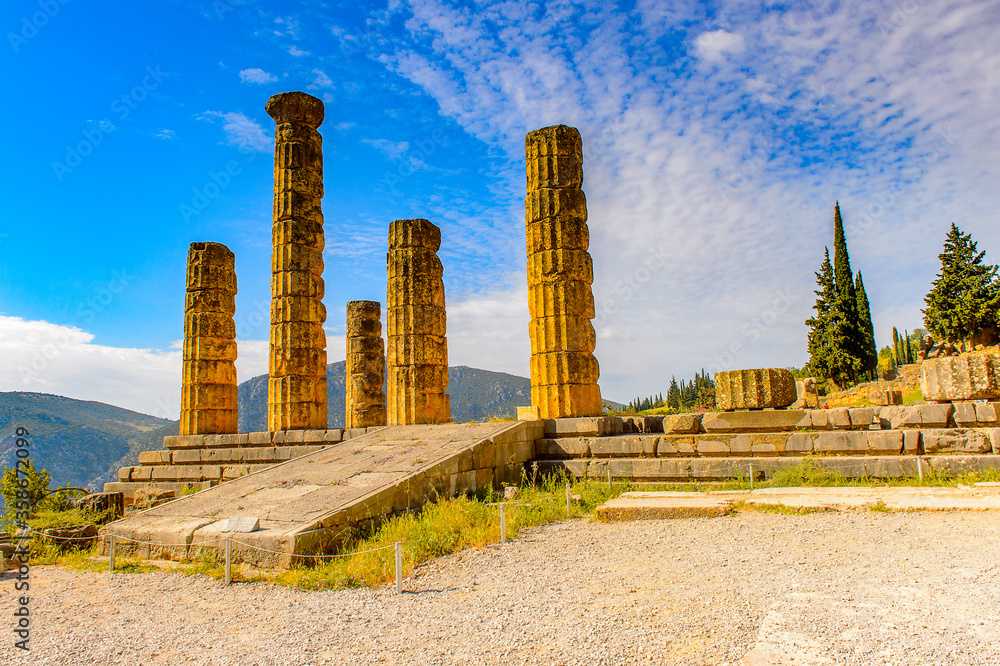 It's Apollo Temple in Delphi, an archaeological site in Greece, at the Mount Parnassus. Delphi is famous by the oracle at the sanctuary dedicated to Apollo. UNESCO World heritage