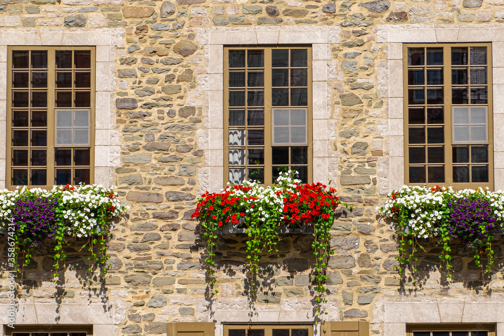 Windows with flower decoration in Quebec City