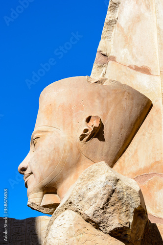 It's Amun Re statue at the Karnak temple, Luxor, Egypt (Ancient Thebes with its Necropolis).