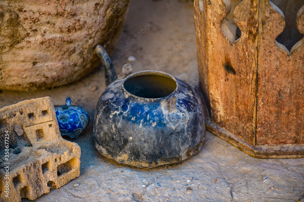 It's Old pieces of dishes in Al Qasr, old village in Dakhla Desert, Egypt It's Old pieces of dishes in Al Qasr, old village in Dakhla Desert, Egypt