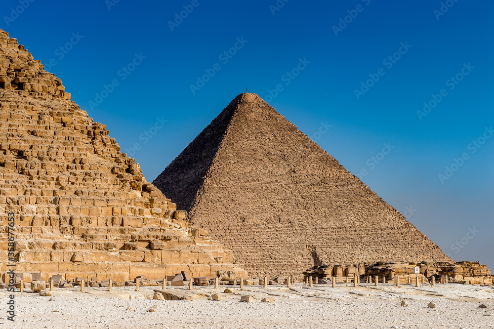 It's Great Pyramid of Giza (Pyramid of Khufu or the Pyramid of Cheops), the oldest and largest of the three pyramids in the Giza Necropolis, the oldest one of the Seven Wonders of the Ancient World