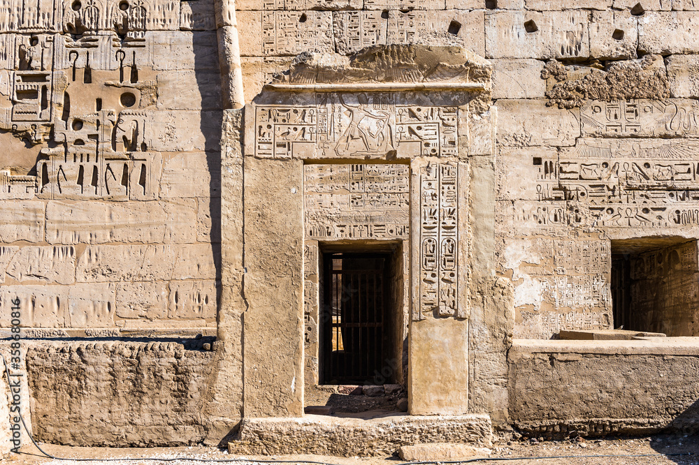It's Wall of the Medinet Habu (Mortuary Temple of Ramesses III), West Bank of Luxor in Egypt.