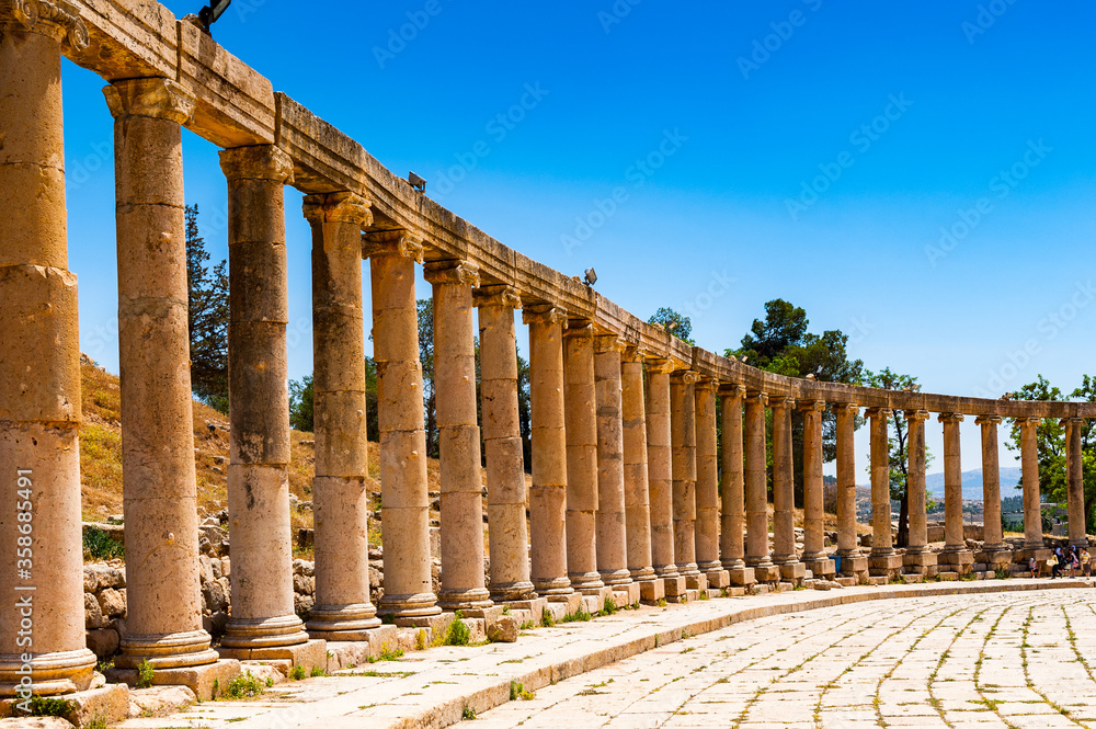 It's Colonnade on the Roman Oval Forum, Ancient Roman city of Gerasa, modern Jerash, Jordan