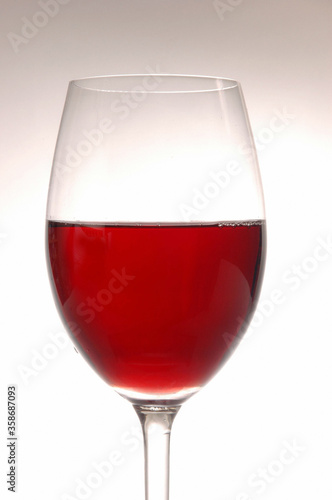 Wine glass containing red wine