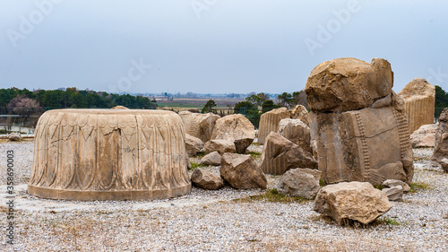 It's Colums of the Apadana of Darius in the ancient city of Persepolis, Iran. UNESCO World heritage site photo