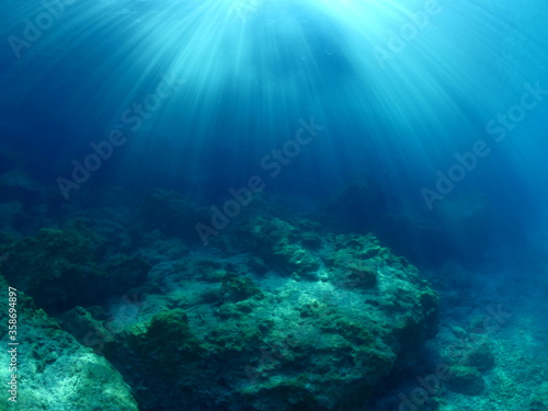 sun ray and sun beam scenery underwater waves on surface of water slow ocean scenery backgrounds