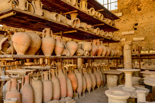 It's Dishes and other things in Pompeii, an ancient Roman town destroyed by the volcano Vesuvius. UNESCO World Heritage site