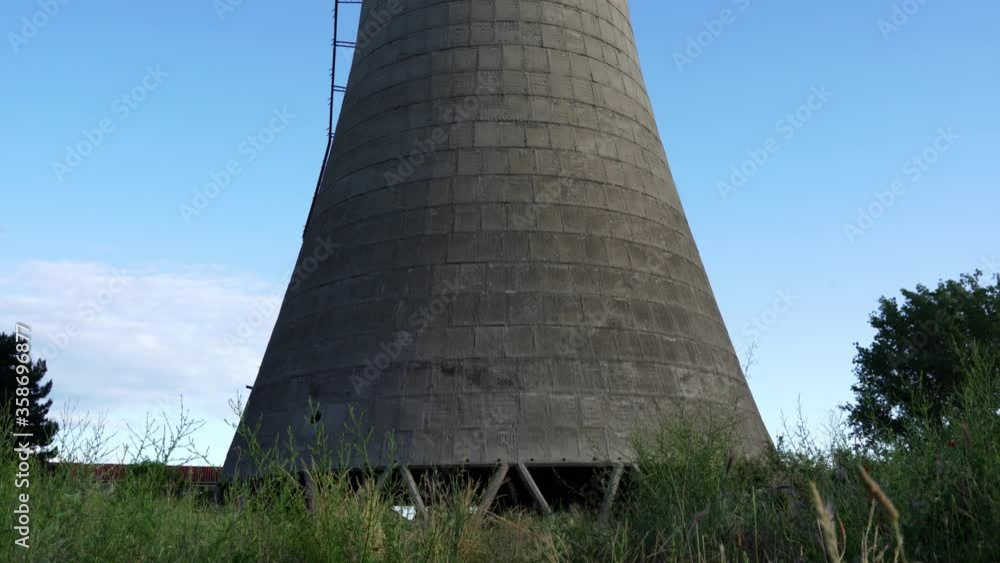Concrete tower of abandoned coal-fired plant station after air pollution on environment Concrete tower of abandoned coal-fired plant station after air pollution on environment