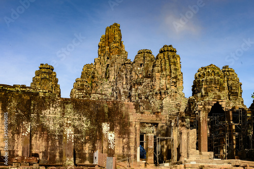 It's Bayon, Khmer temple at Angkor in Cambodia. Official state temple of the Mahayana Buddhist King Jayavarman VII