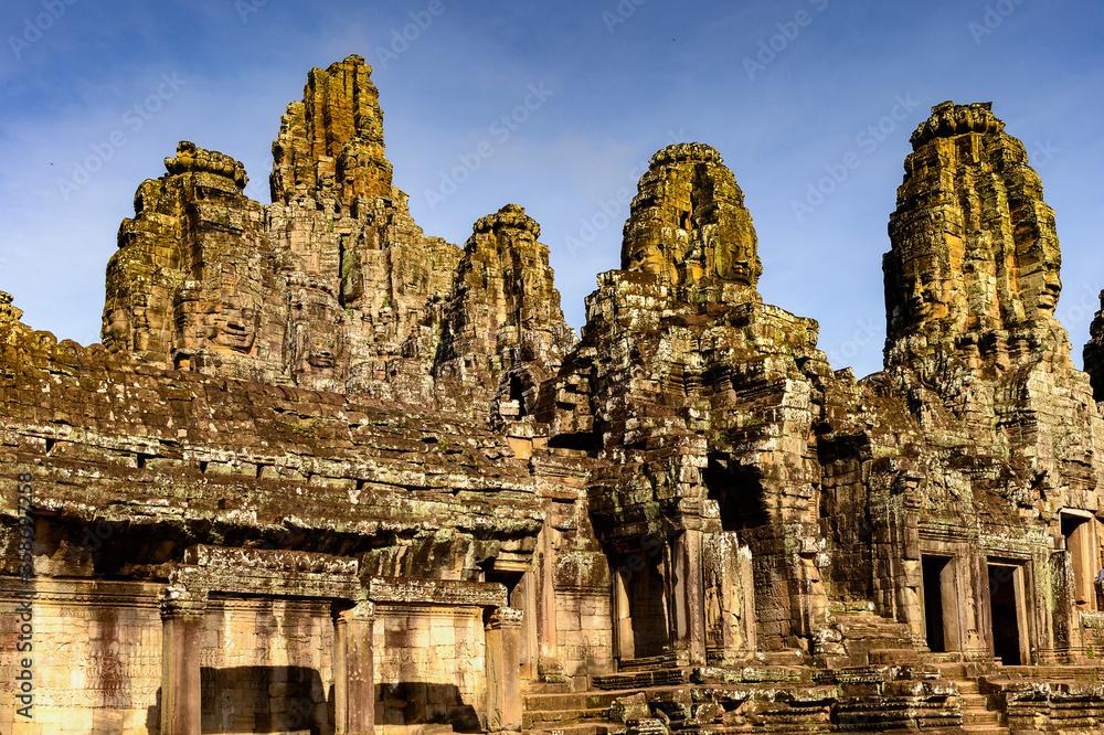 It's Bayon, Khmer temple at Angkor in Cambodia. Official state temple of the Mahayana Buddhist King Jayavarman VII