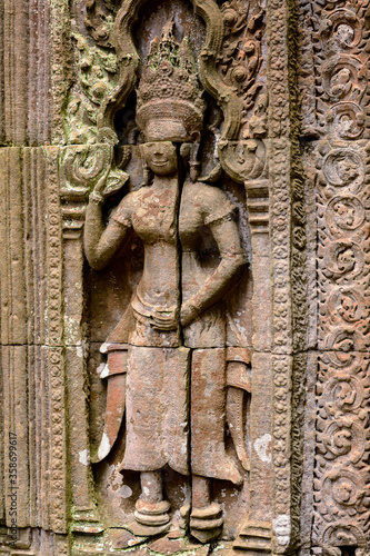 It's Part of the Ta Prohm (Rajavihara), a temple at Angkor, Province, Cambodia. It was founded by the Khmer King Jayavarman VII as a Mahayana Buddhist monastery and university.