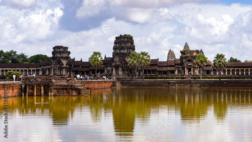 It's Angkor Wat (Temple City) and its reflection, a Hindu, then a Buddhist, temple complex in Cambodia and the largest religious monument in the world.