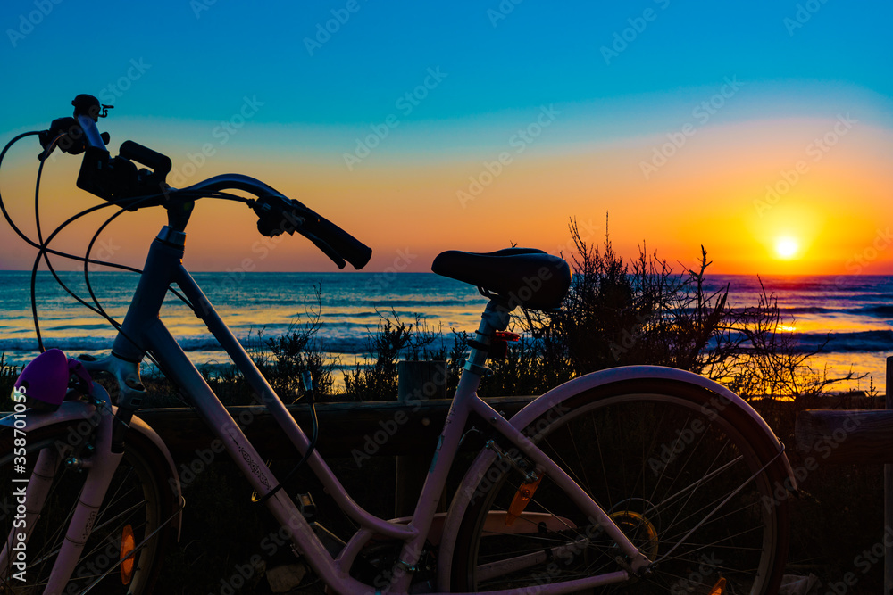 Fototapeta premium Bicycle on beach, active lifestyle.