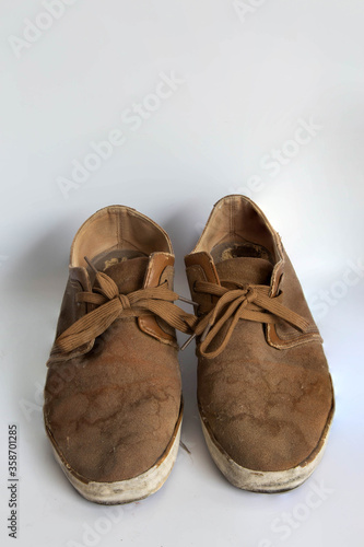 sneakers dirty isolated on white background, Footwear for outdoor activities,
