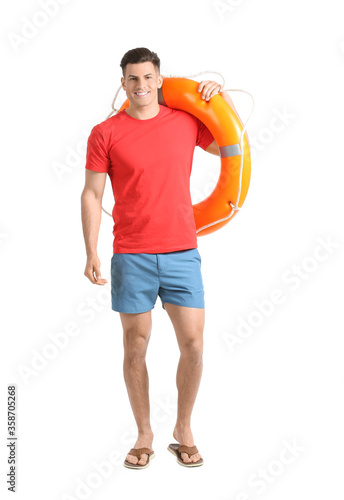 Beach rescuer with lifebuoy...