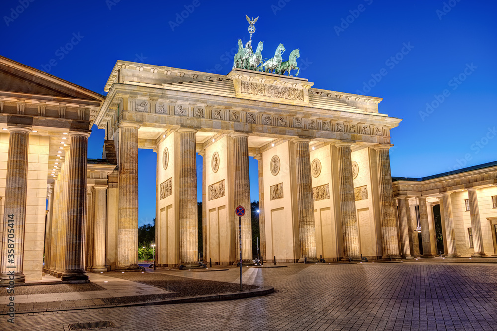 The famous illuminated Brandenburg Gate in Berlin at blue hour with no people
