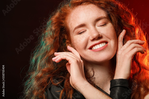Portrait of beautiful redhe...