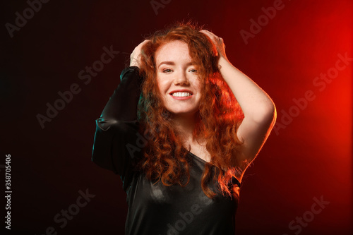 Portrait of beautiful redhe...