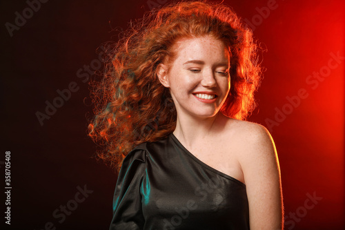 Portrait of beautiful redhe...