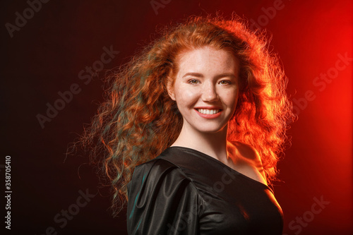 Portrait of beautiful redhe...
