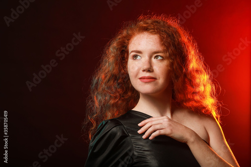 Portrait of beautiful redhe...