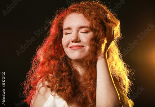 Portrait of beautiful redhe...