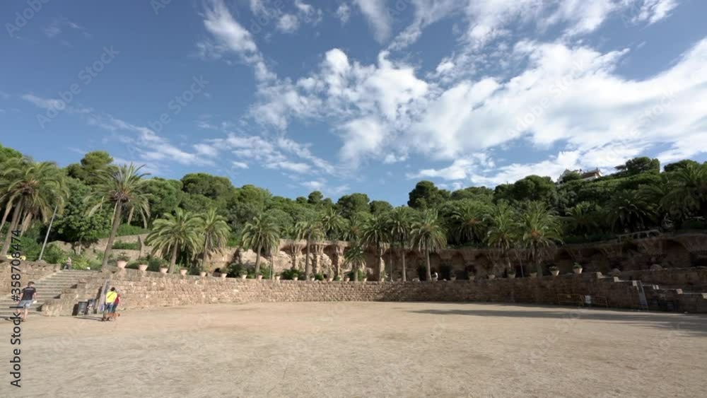 BARCELONA, CATALONIA, SPAIN - JUNE 17, 2020: The park most visited by tourists in Barcelona, Parc Güell, during the Covid-19 doesn't have a tourist. You can only see a neighbor of the city walking. BARCELONA, CATALONIA, SPAIN - JUNE 17, 2020: The park most visited by tourists in Barcelona, Parc Güell, during the Covid-19 doesn't have a tourist. You can only see a neighbor of the city walking.