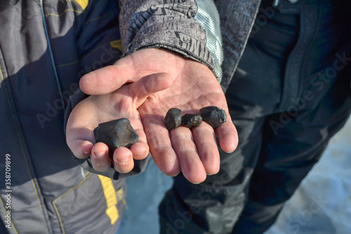 fragments of the Chelyabinsk meteorite found in winter and spring of 2013 photo