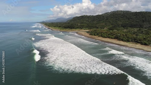 Wallpaper Mural Dominical, Costa Rica. Aerial View of Serene Tropical Beach and Thick Rainforest on Sunny Day Torontodigital.ca