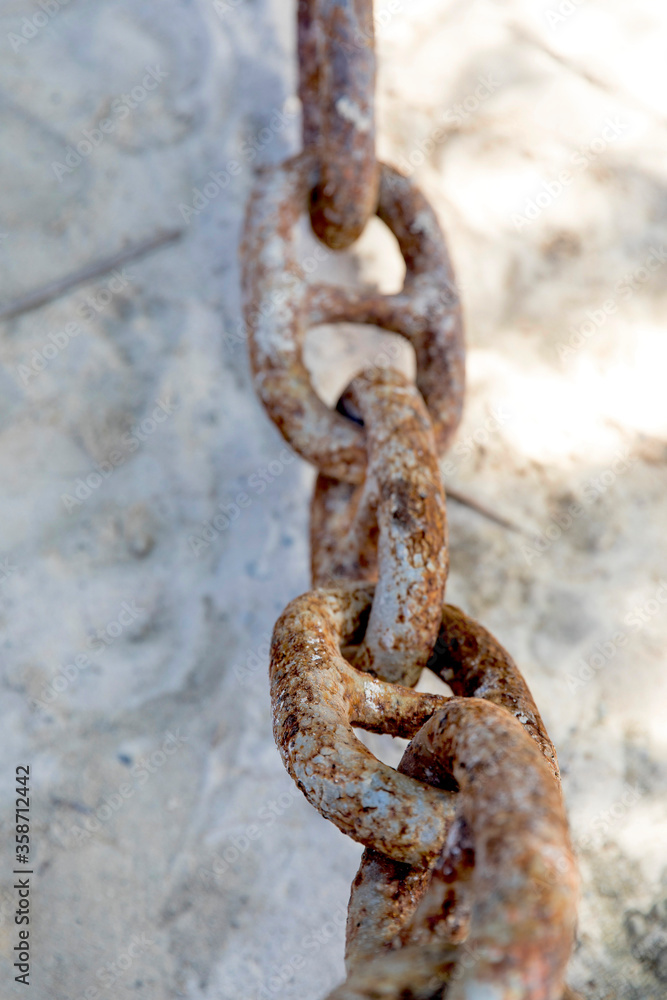 old rusty chain, white beach path, Boracay island, Philippines. old rusty chain, white beach path, Boracay island, Philippines.