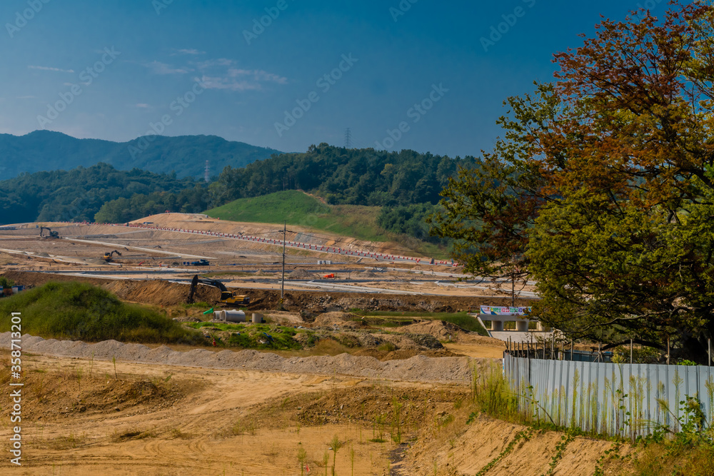 Landscape of site of new large construction construction project.